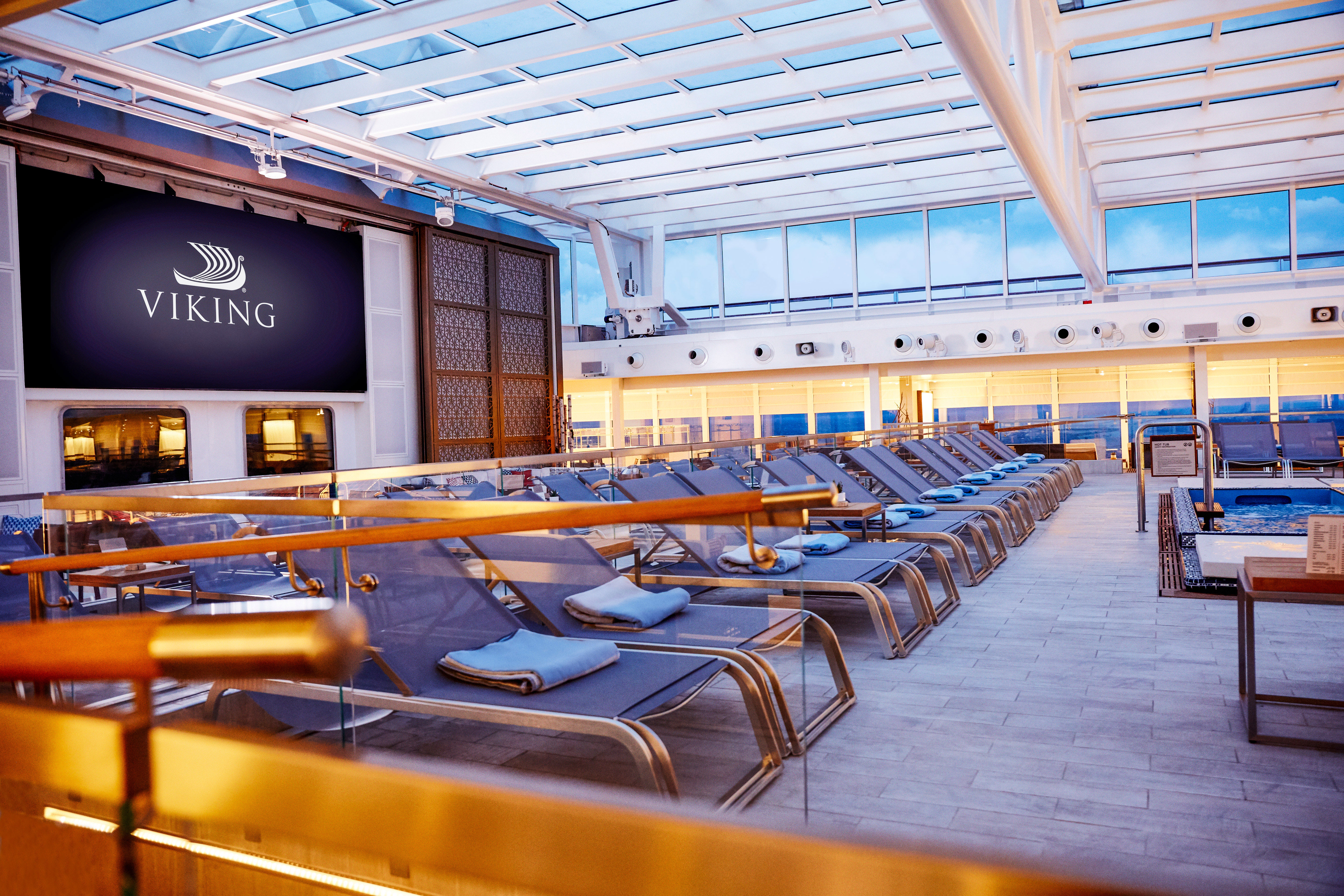Comfortable lounge beds by the pool