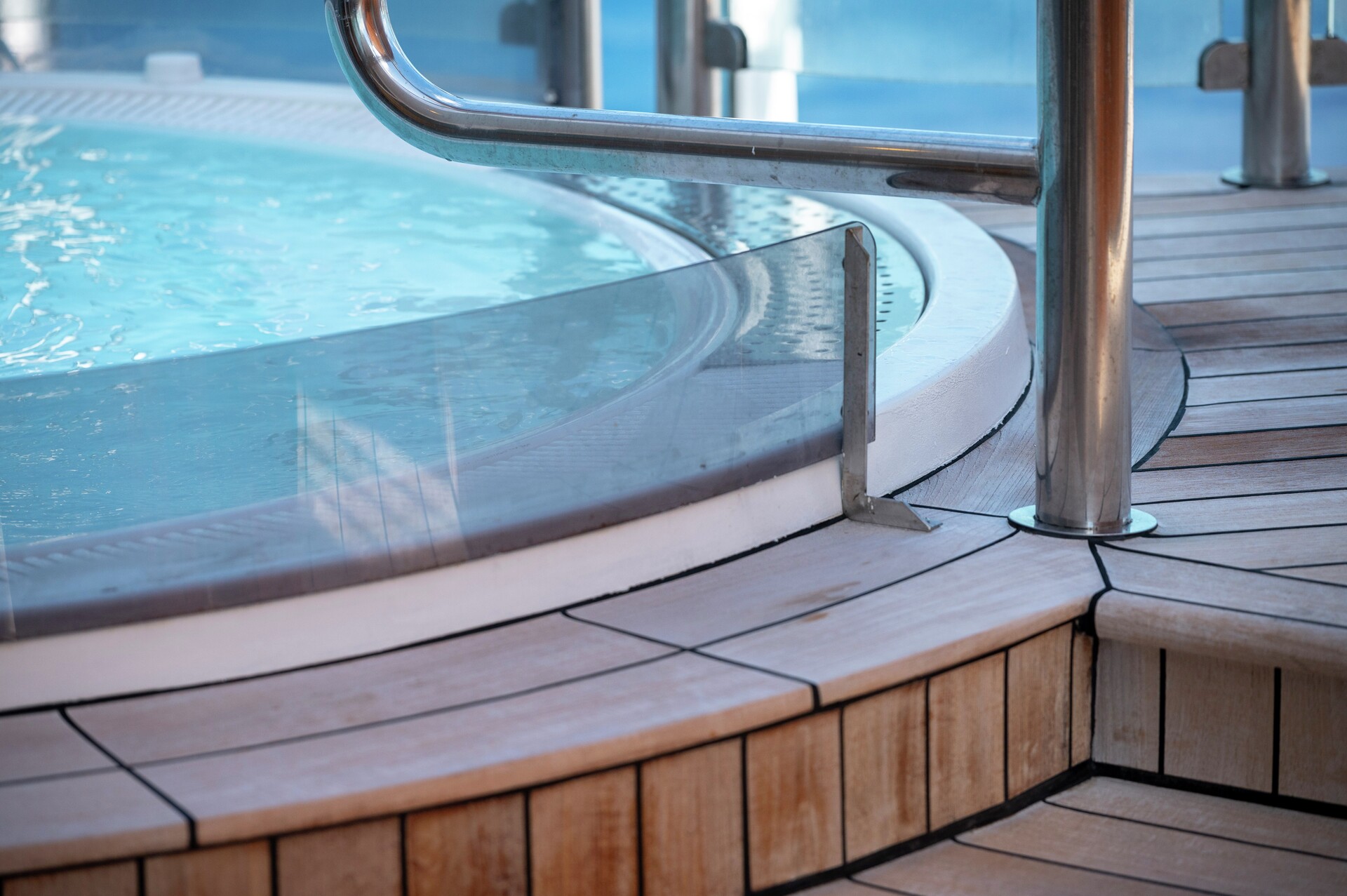 Relax in two hot tubs on deck 7