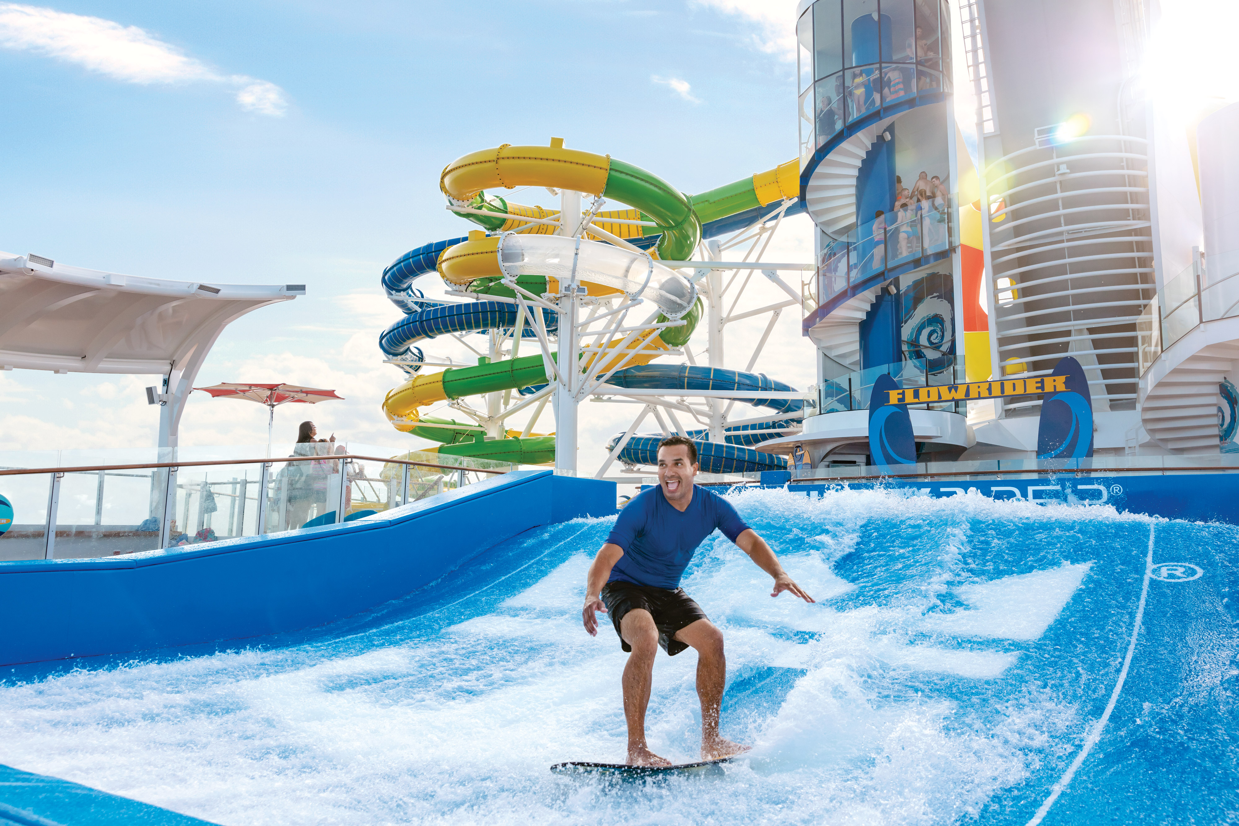 The Flowrider surf simulator with the Perfect Storm waterslide in the background