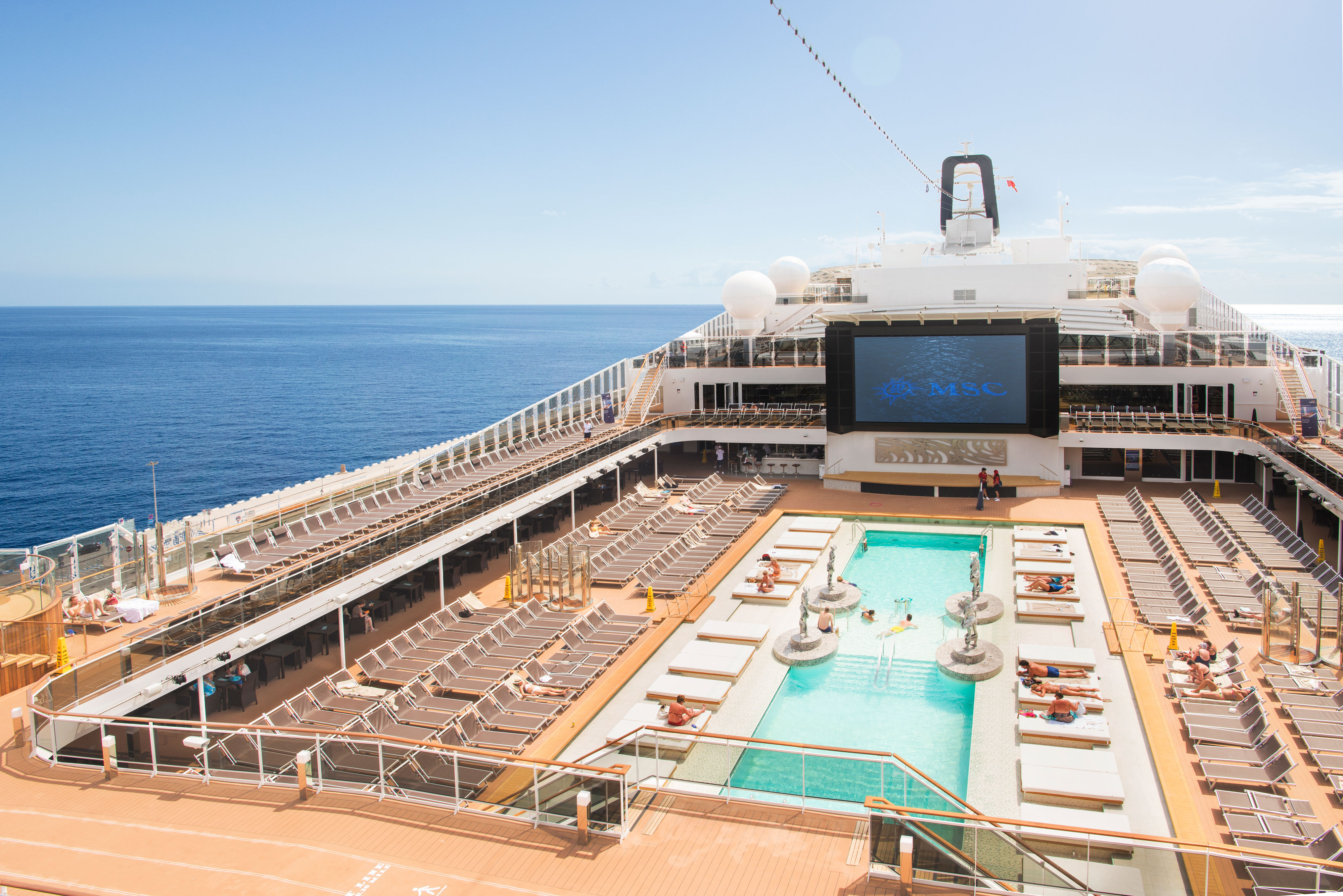 The pool deck with movies under starry skies