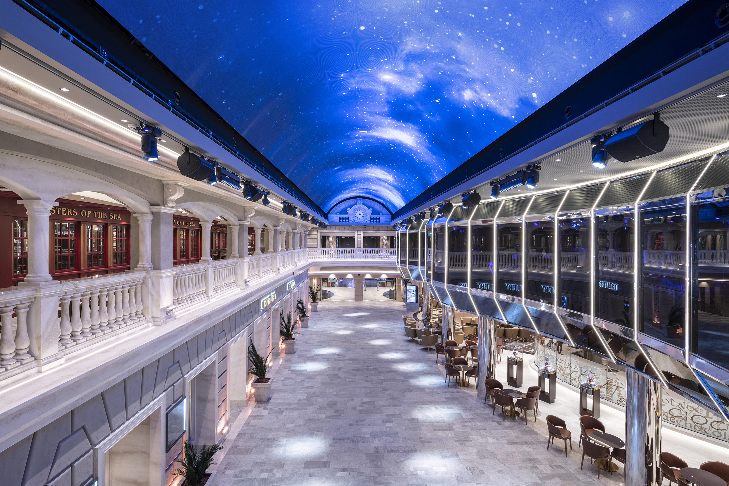 The 300 feet long street full of shops, bars and restaurants under a 500 square feet LED screen