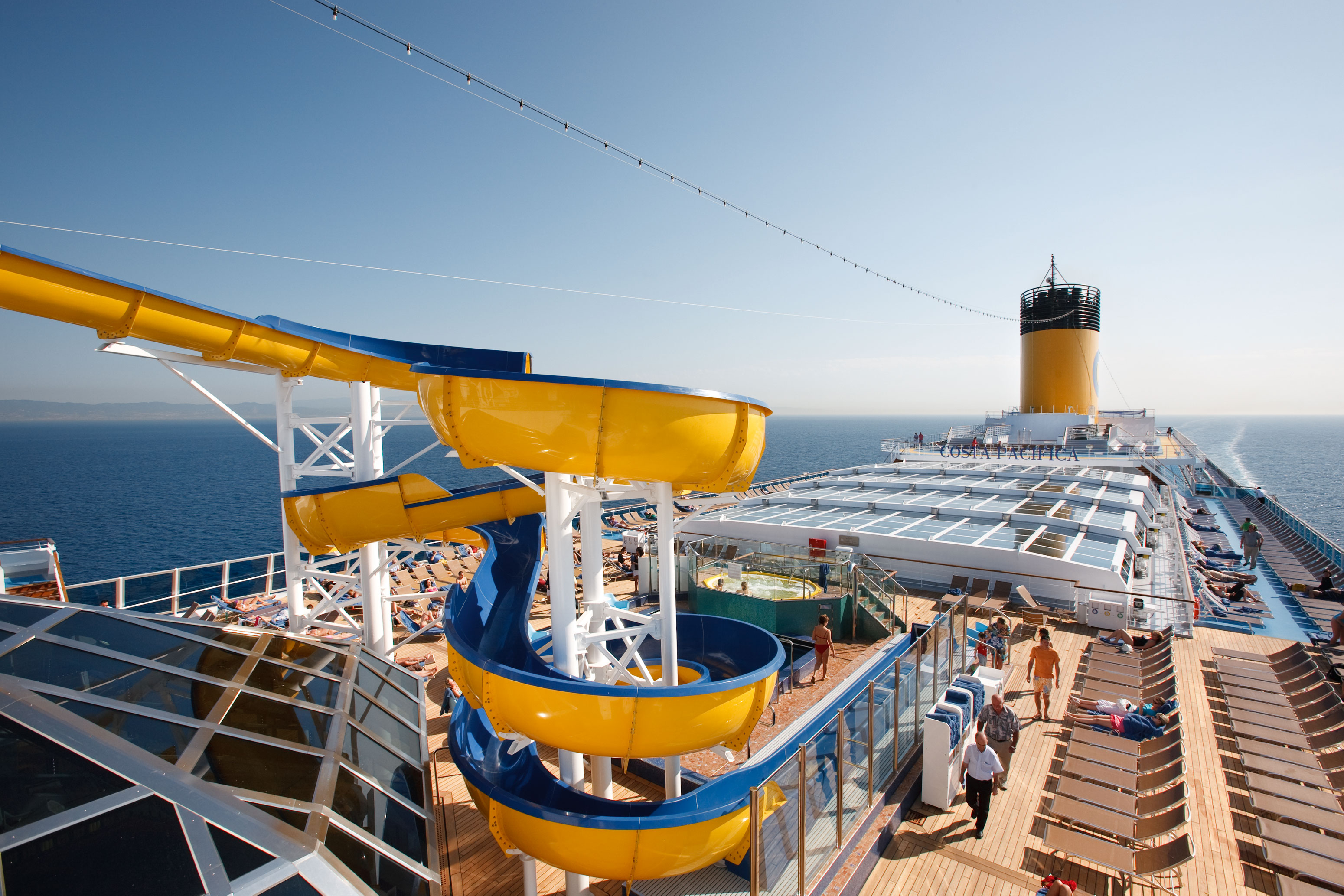 The waterslide towering over the pool deck