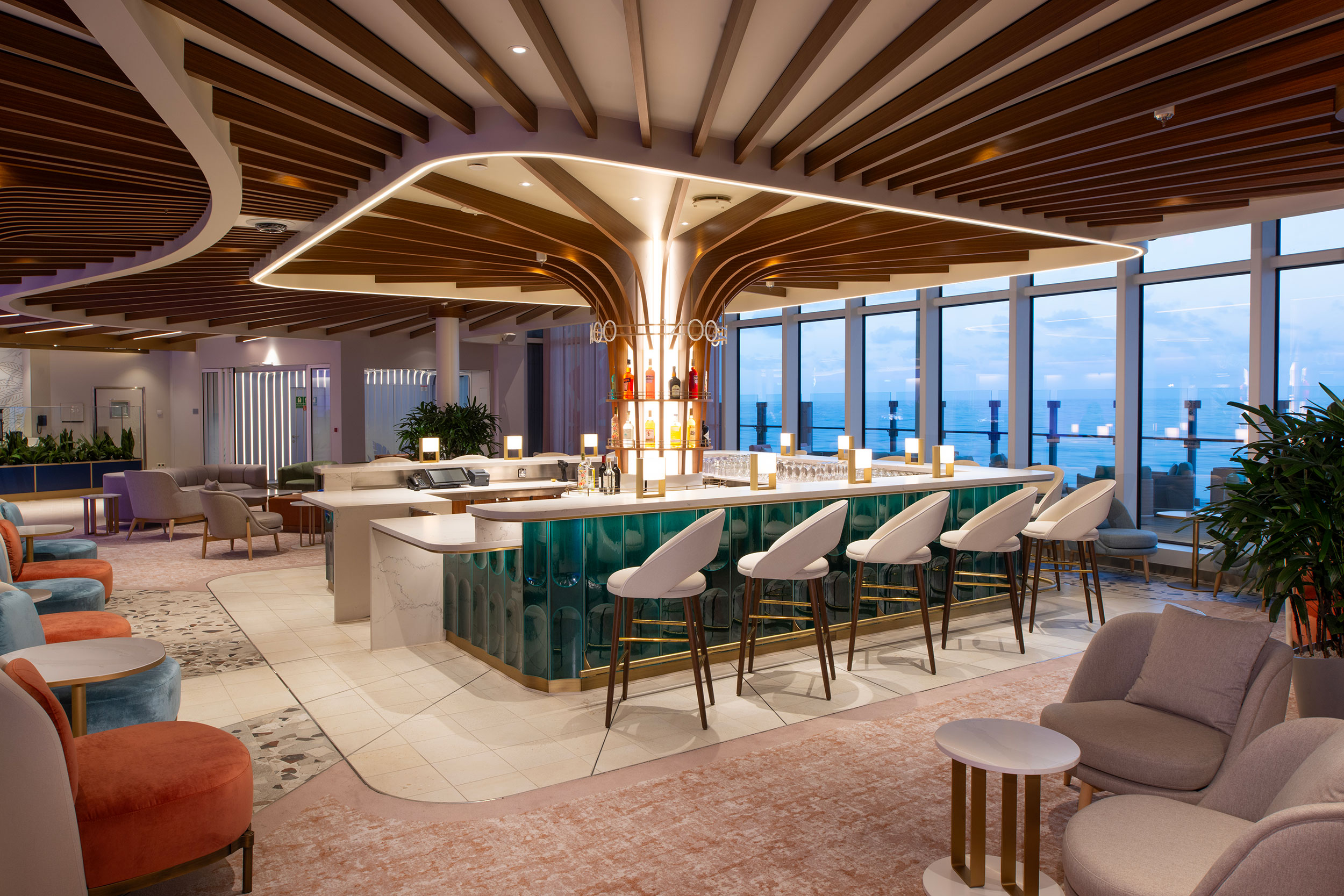 Enjoy a cocktail in The Lobby bar - the bar has a colorful mosaic canopy overhead after sunset