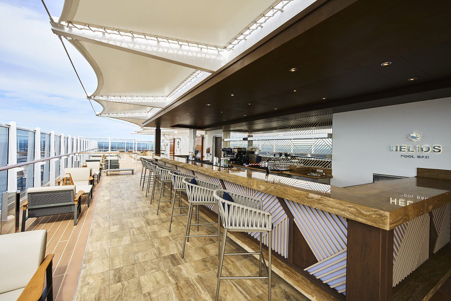 Enjoy a cocktail at the Helios Pool Bar