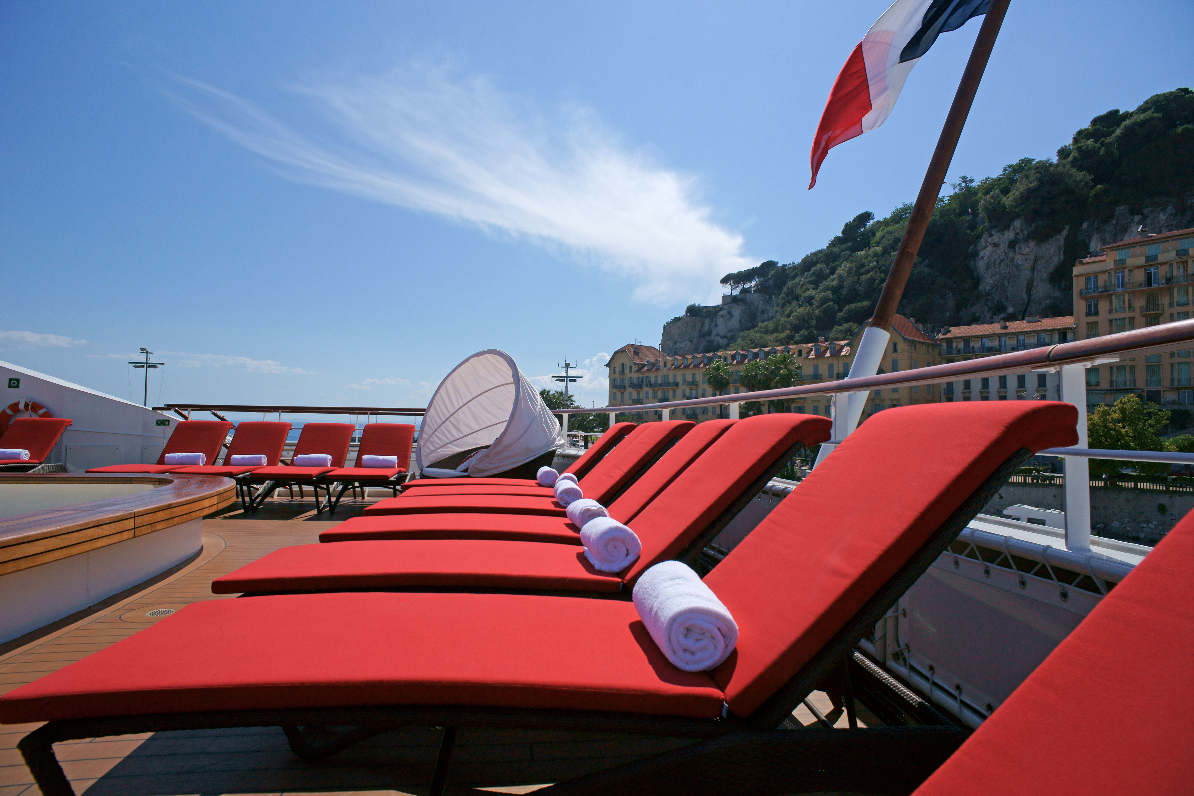 Comfortable lounge beds by the pool.