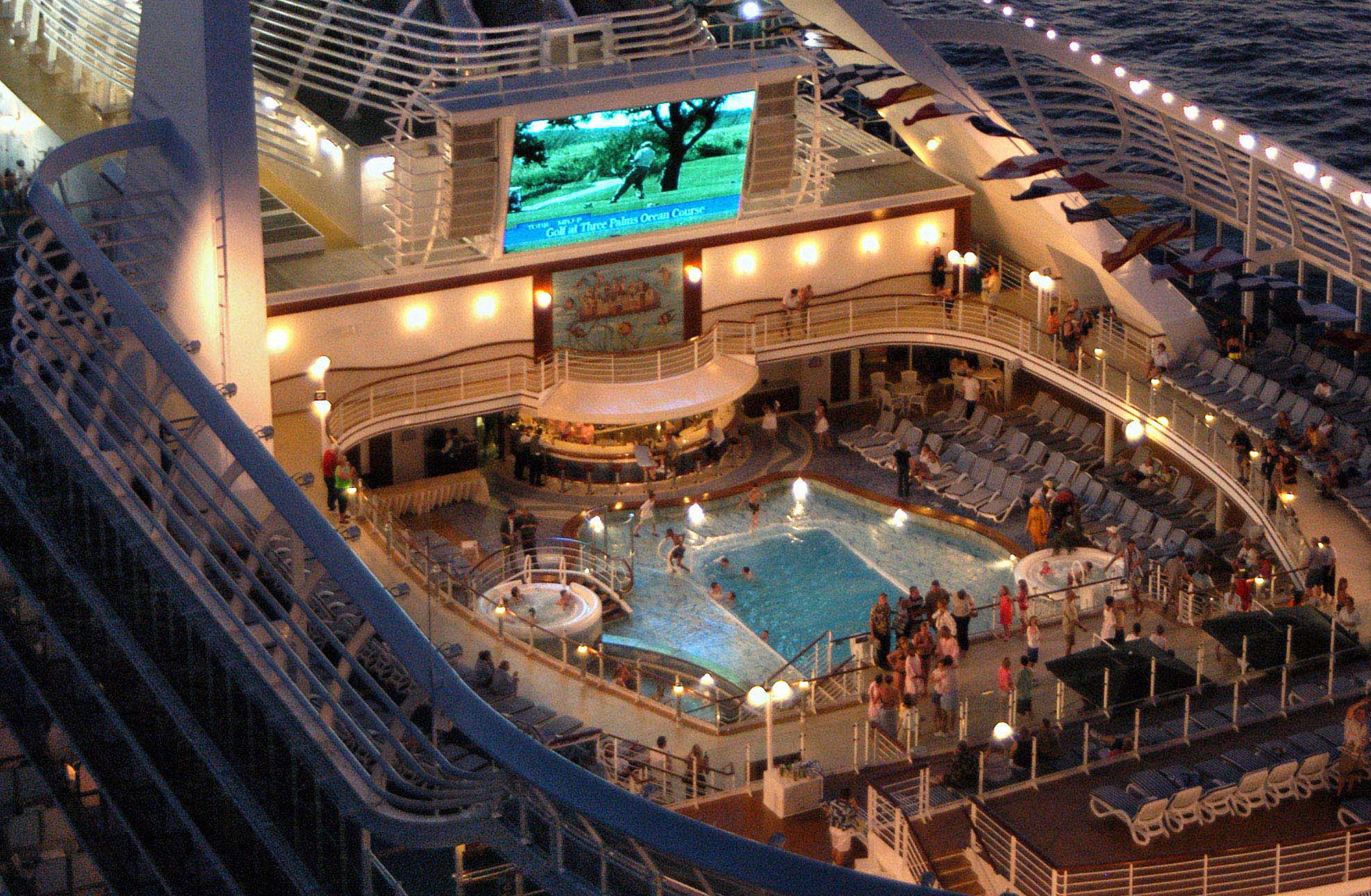 Watch a movie under the stars on the pool deck