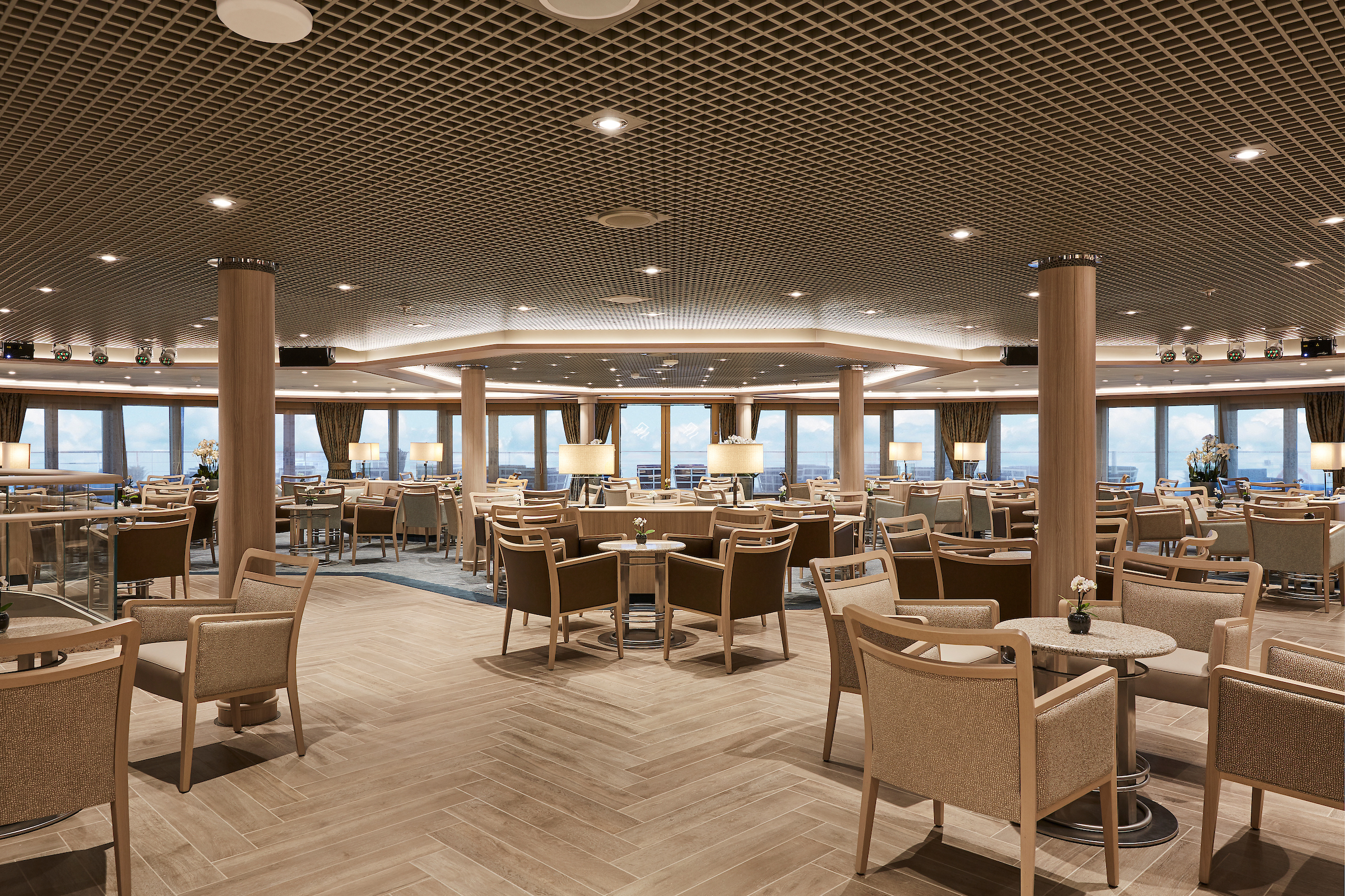 Listen to the gentle sounds of a pianist in Panorama Lounge