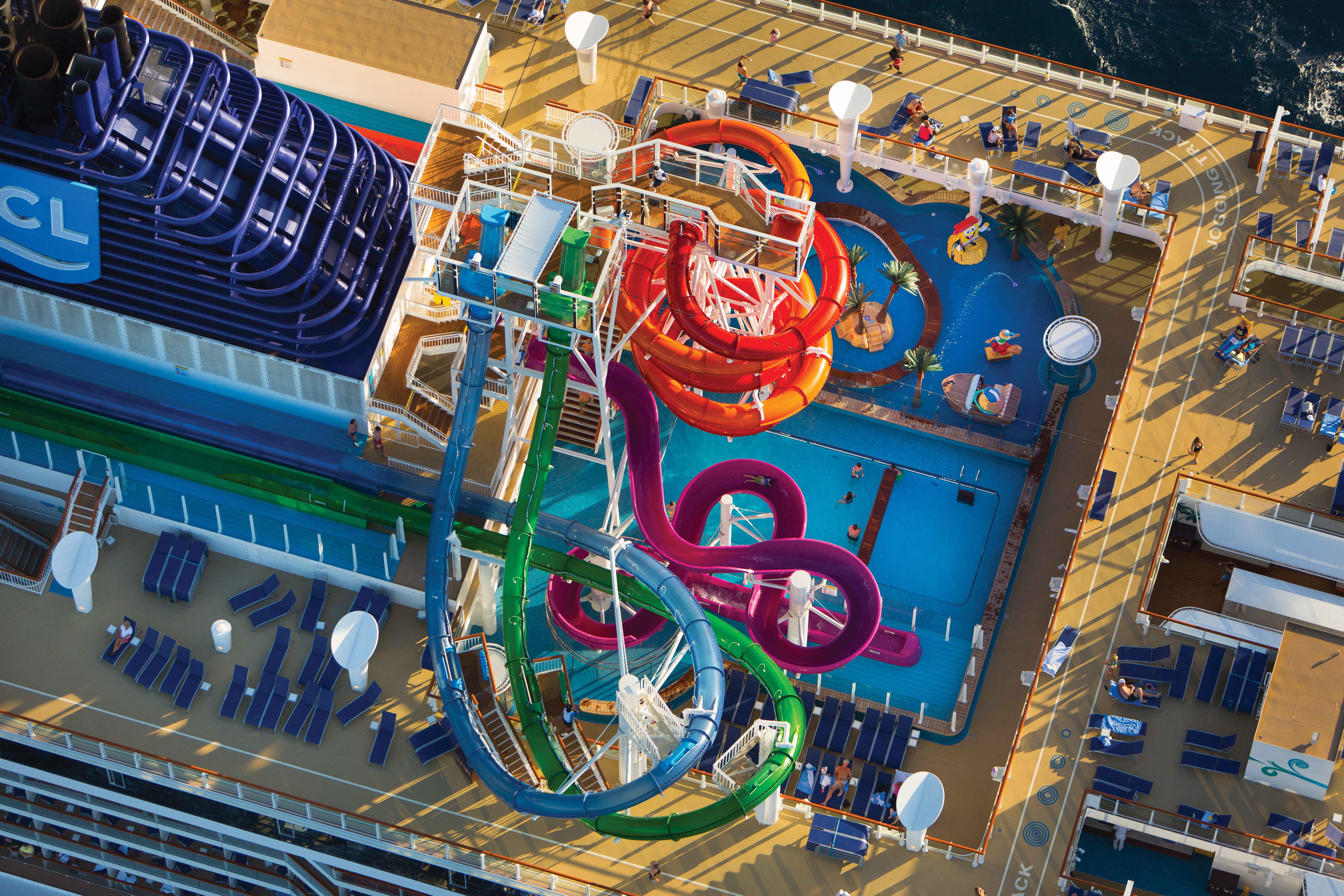 3 water slides over the pool deck