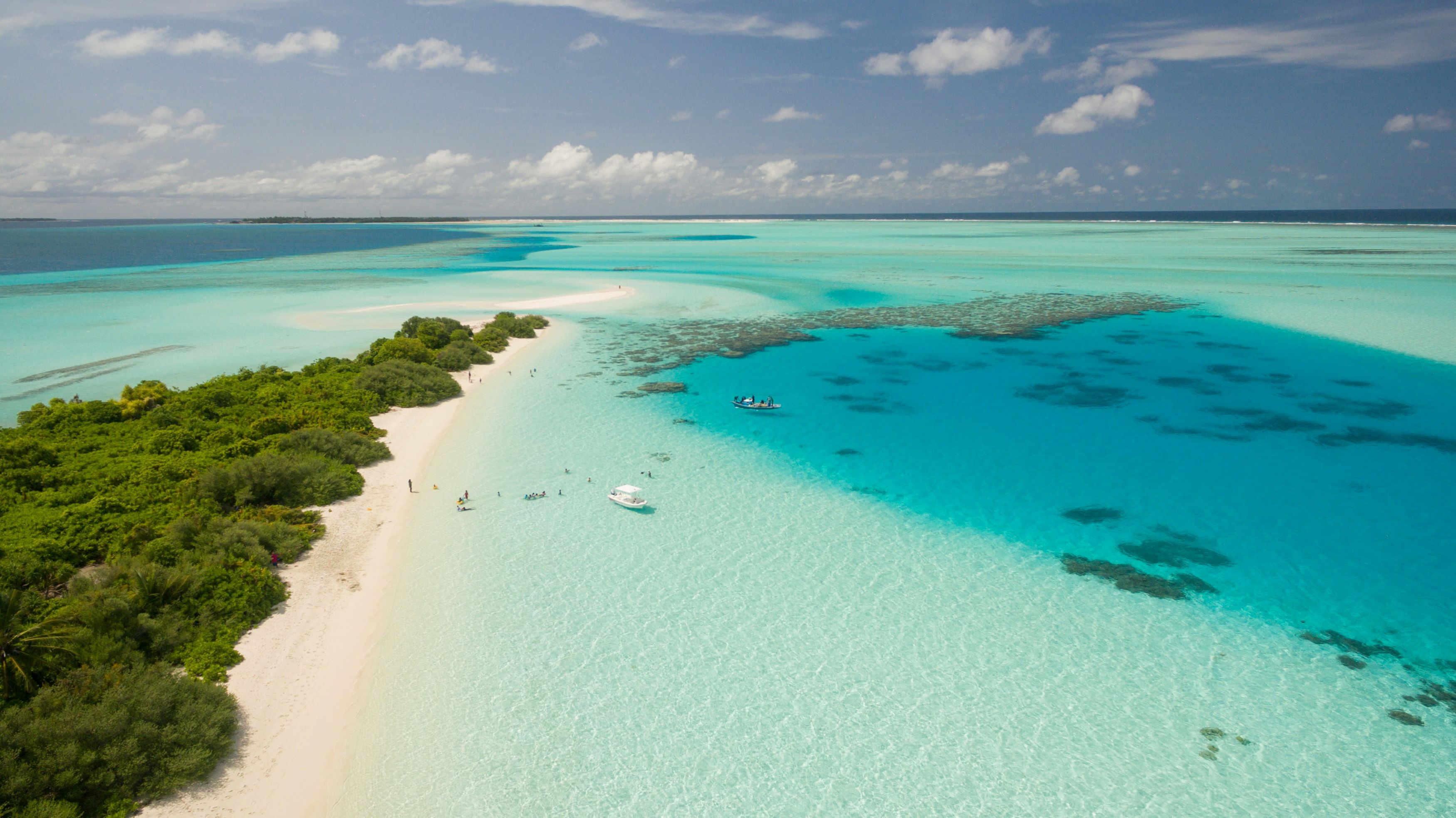 Caribbean Beach picture courtesy of Ishan See from the Sky, Unsplash