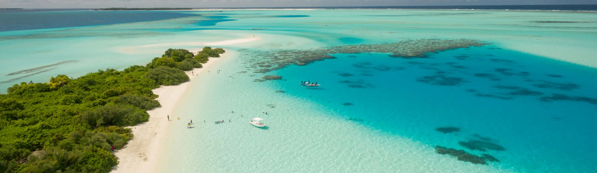 Caribbean Beach picture courtesy of Ishan See from the Sky, Unsplash