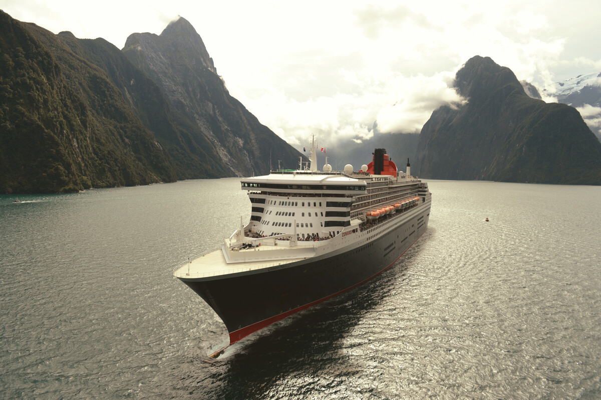 Cunard QM2 cruising in Milford Sound