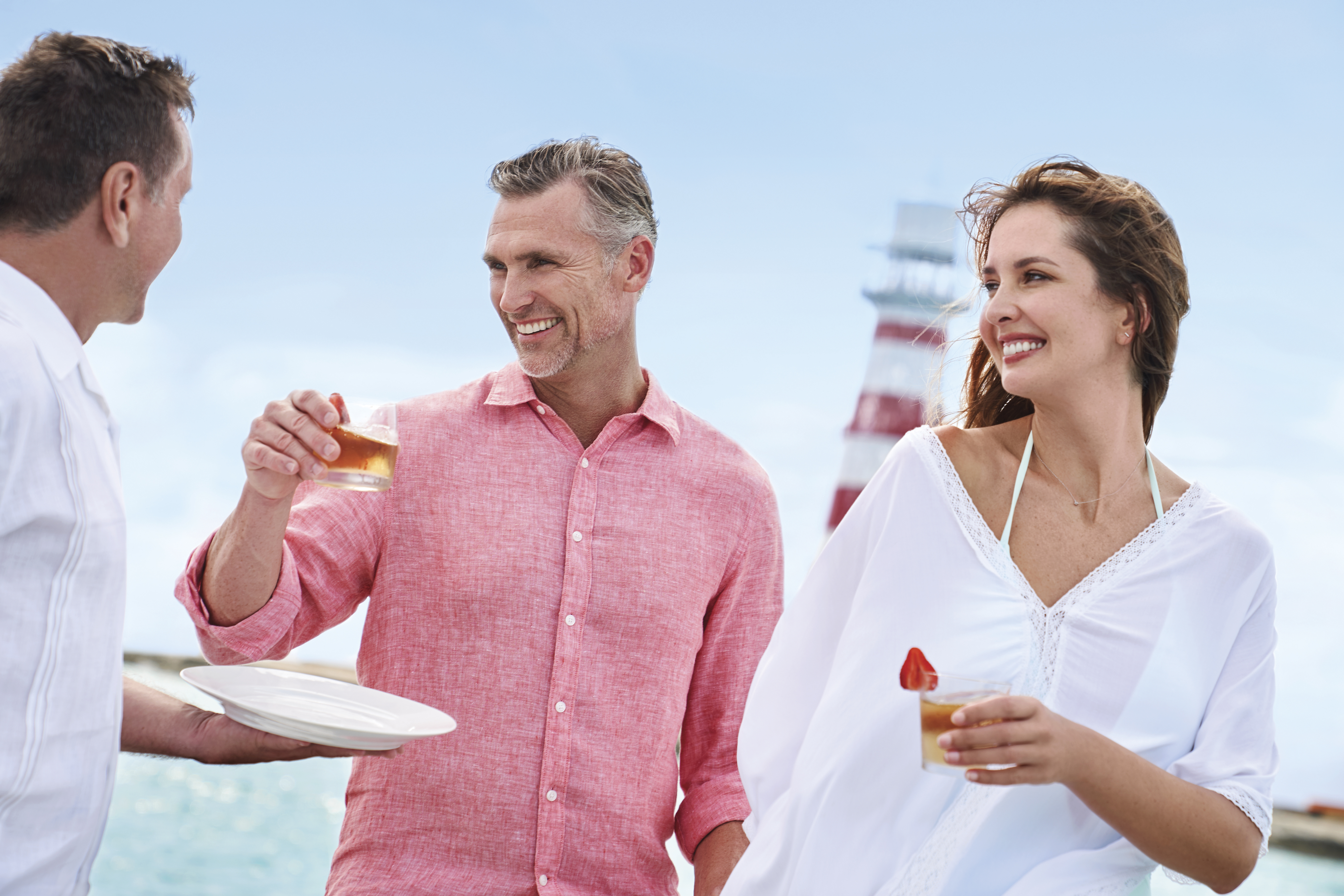 Couple being served a drink