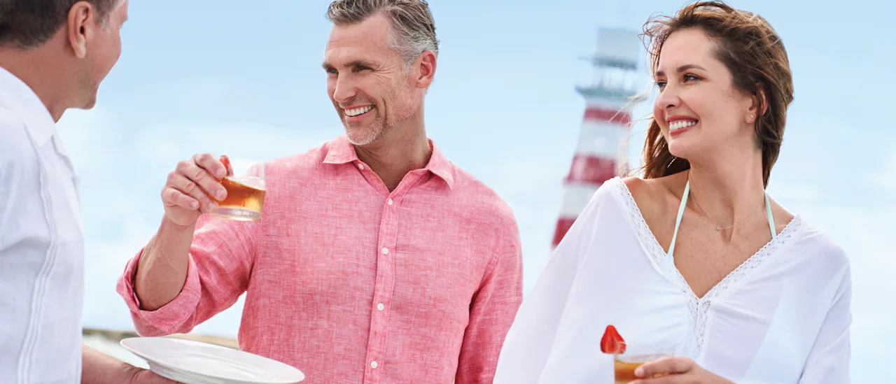 Couple being served a drink