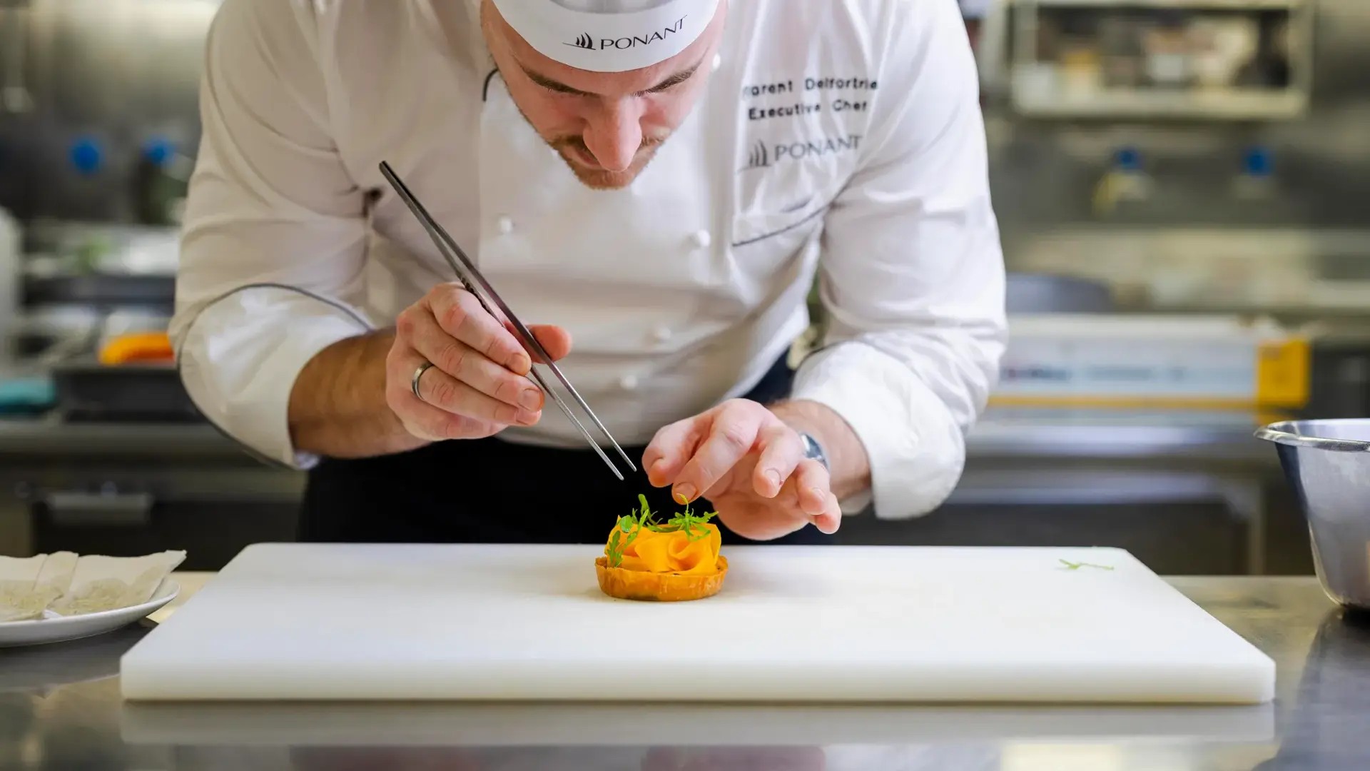 Chef putting final touches on dish
