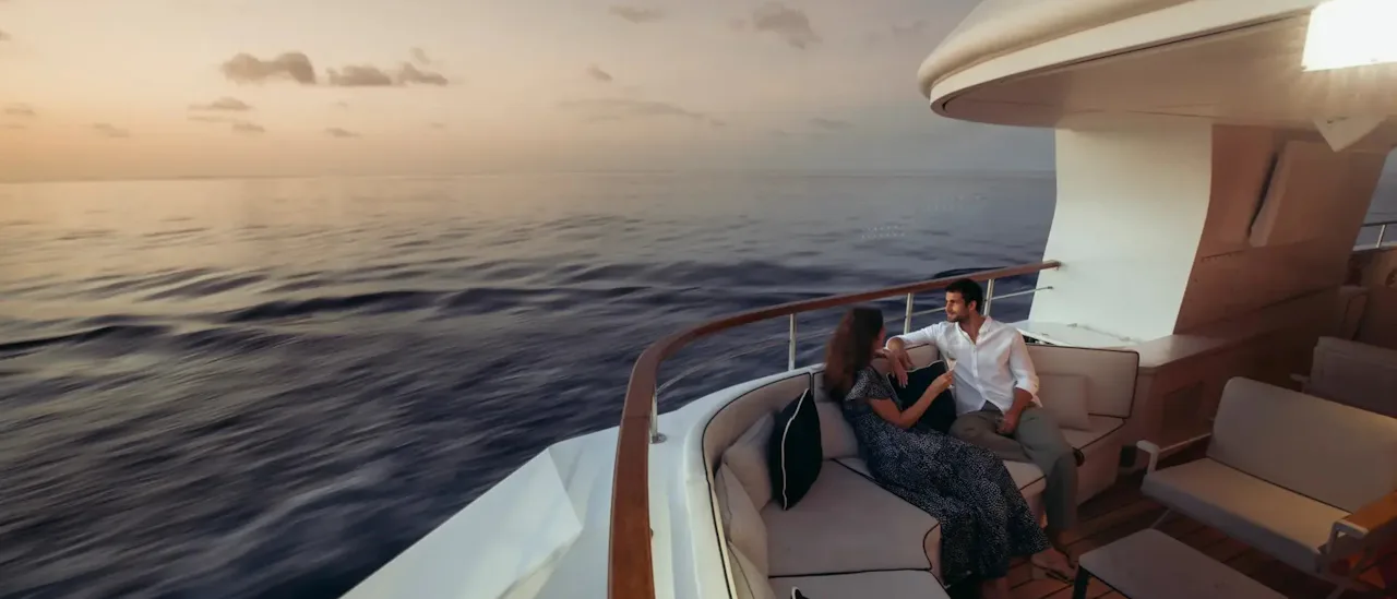 Couple relaxing onboard