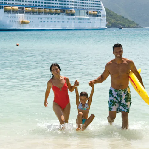 Voyager of the Seas with family at the beach