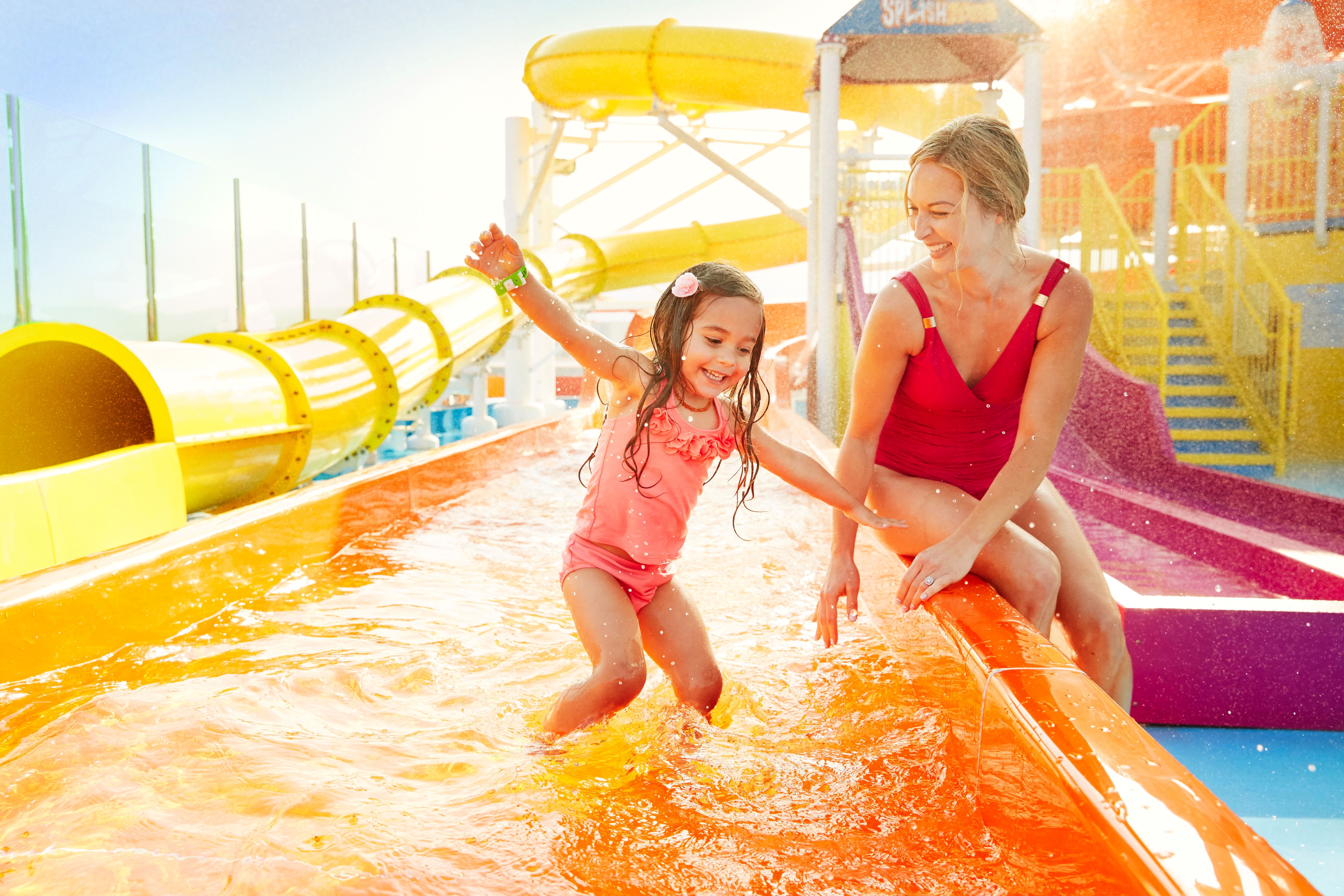 Mother & daughter on waterslides