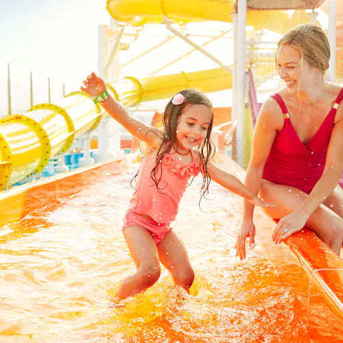 Mother & daughter on waterslides